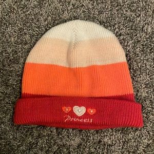 A beanie that says princess with a matching scarf